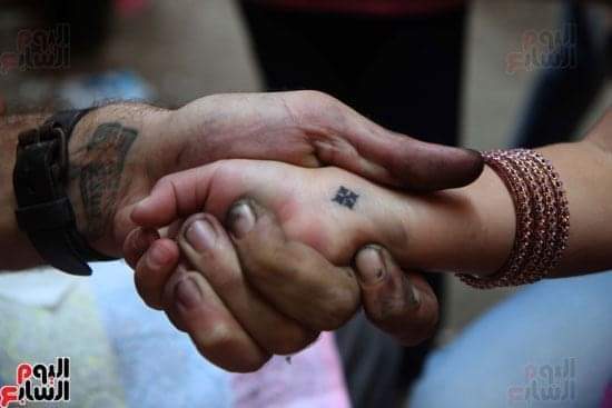콥트 기독교인인 친구의 손목에 새겨진 십자가. 사진= 신나리